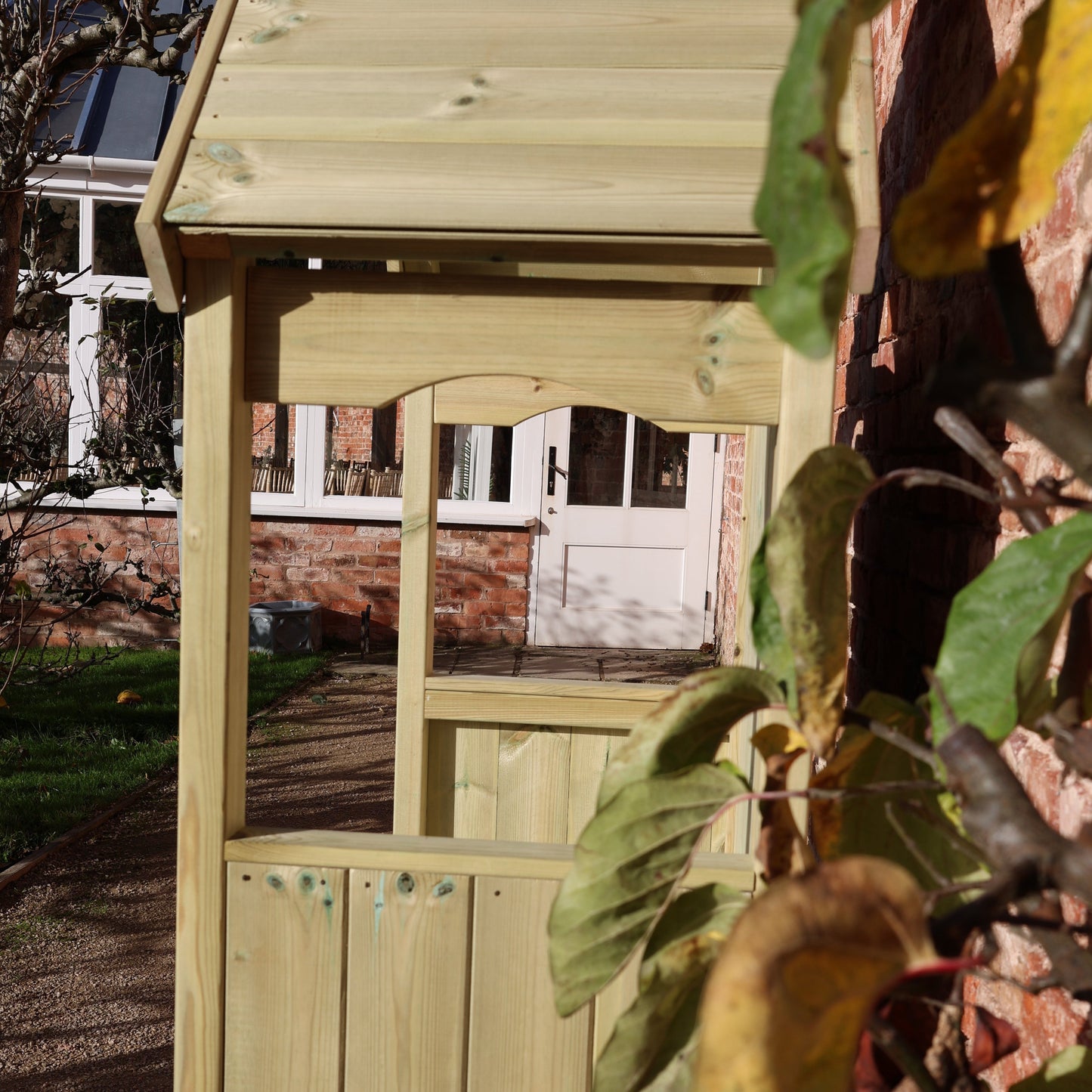Wooden garden arbour with storage